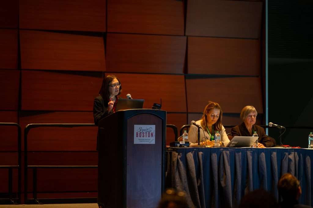 Dr. Wendy Chung presenting on stage